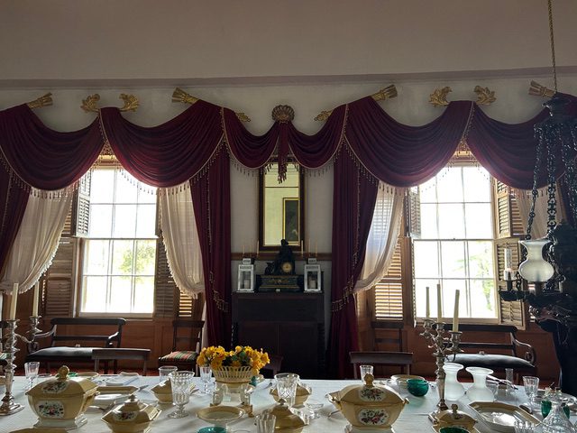 Hyde Hall dining room with our drapes and under curtains
